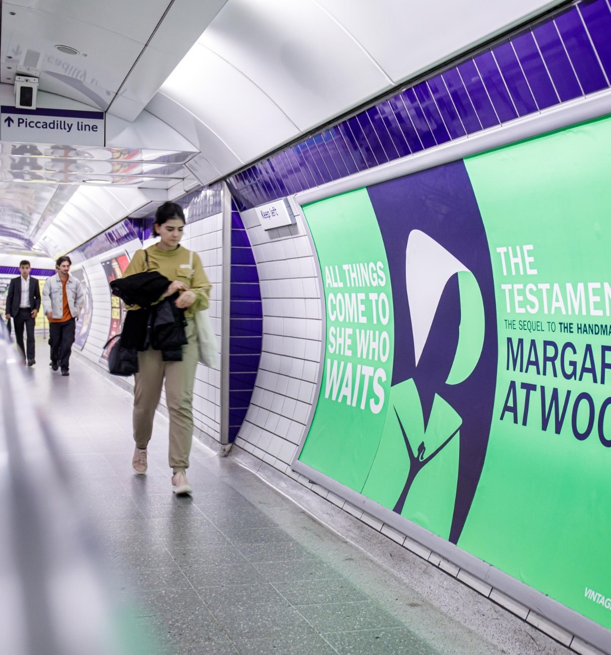 12 Sheet tube advertising in London Underground corridor