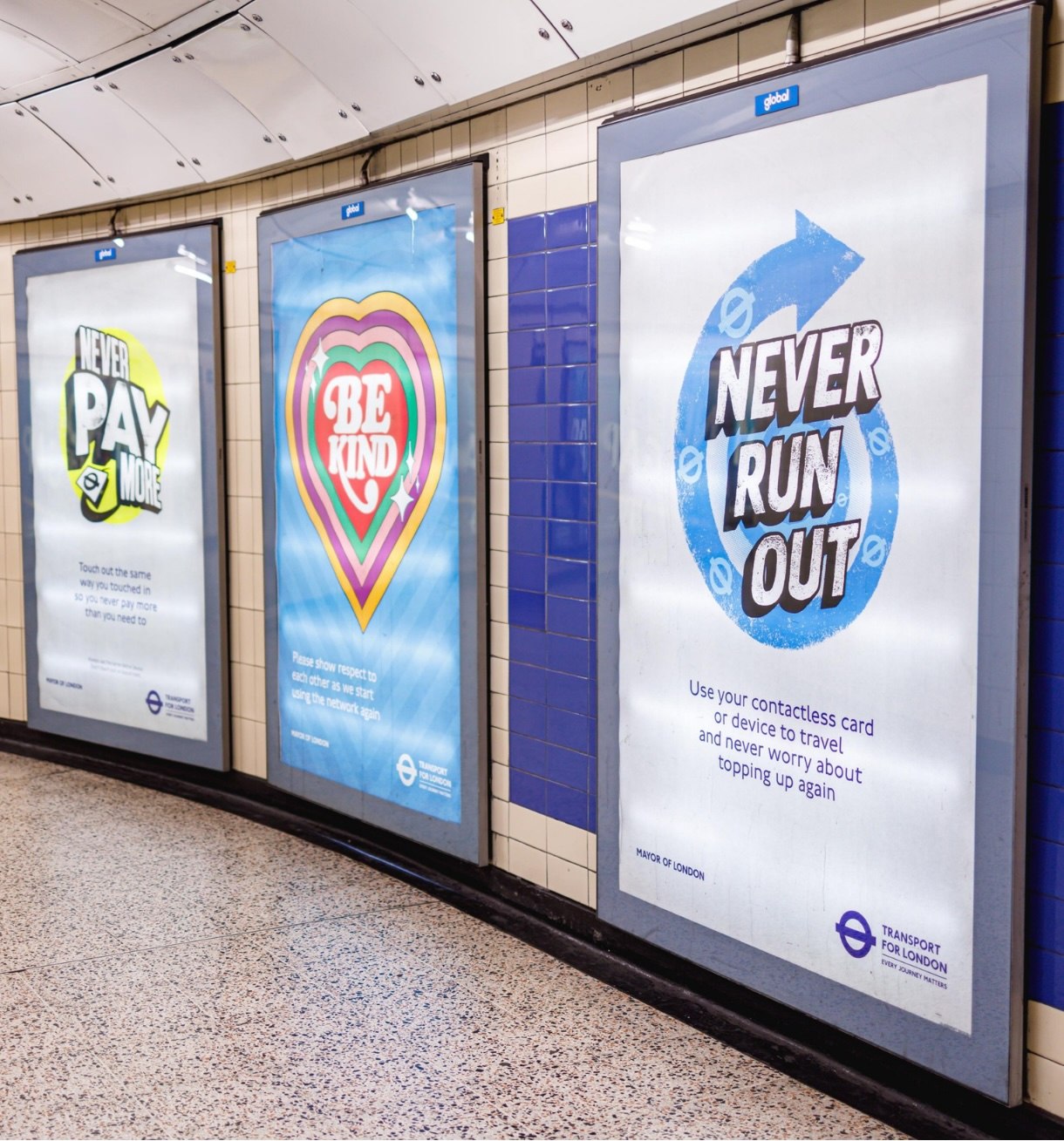 6 Sheet tube advertising panels on London Underground platform