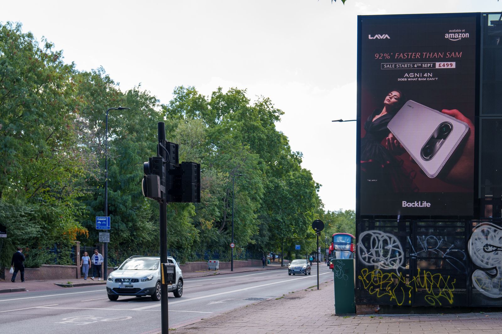 The LAVA advert on a portrait roadside screen on Brixton Hill