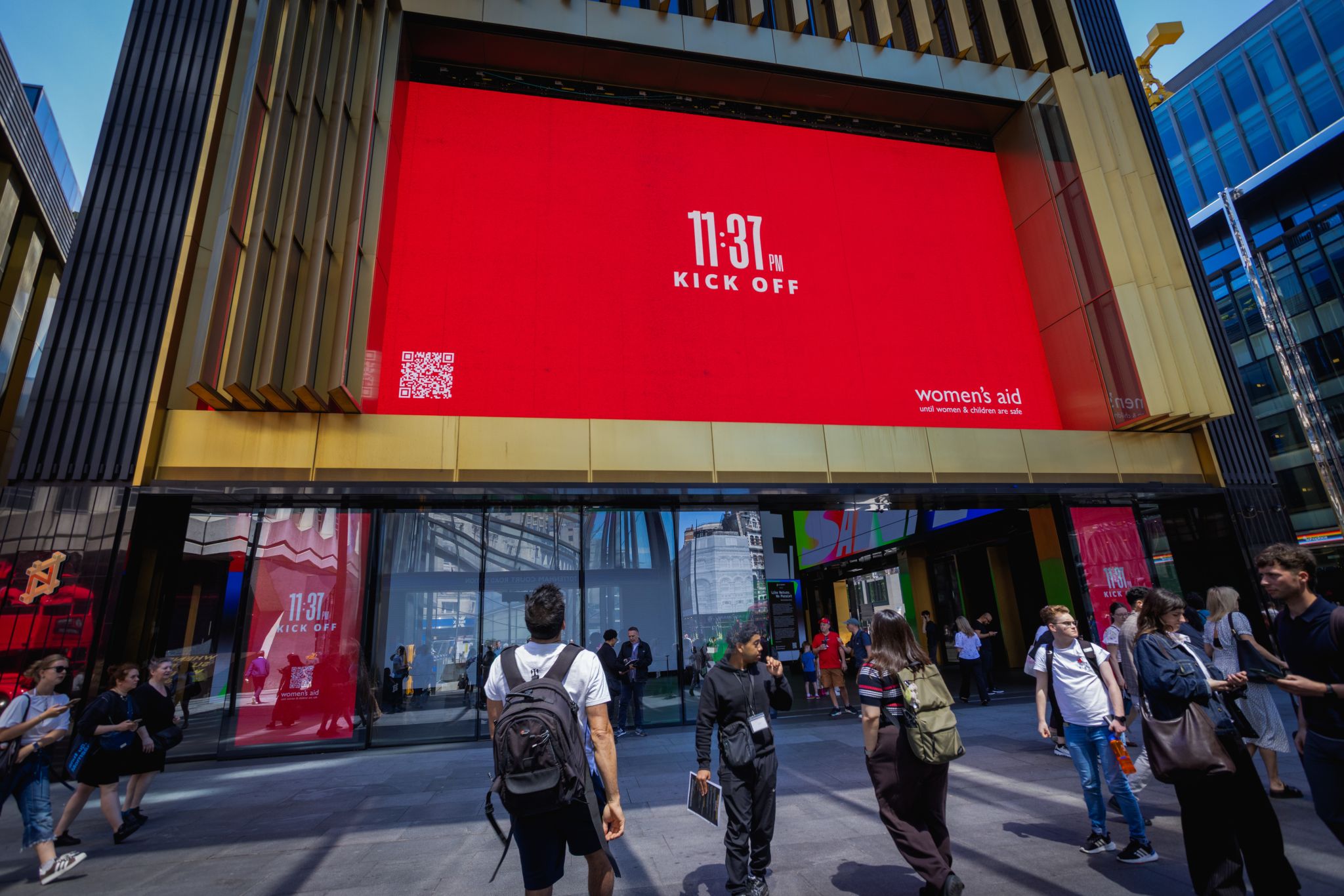 The Other Kick Off campaign on a large-format digital screen in the city centre