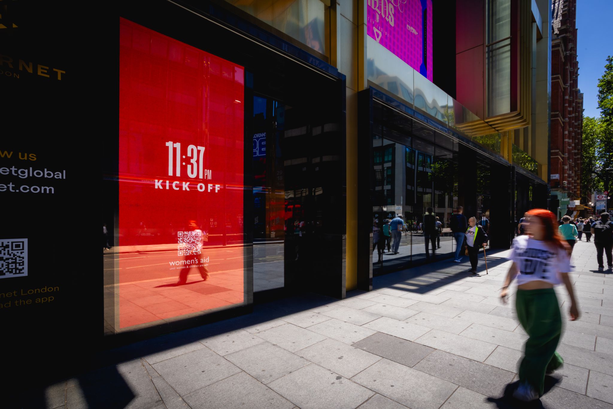 The Other Kick Off campaign: Outernet London, street level, with the scan-to-support QR code